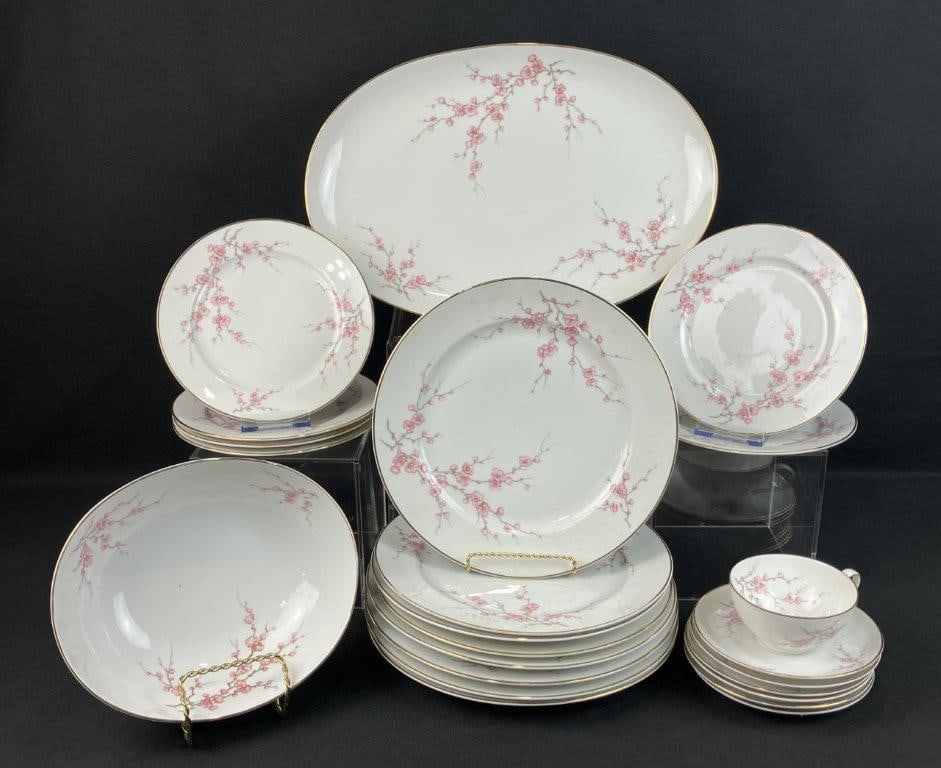 Hutschenreuther Almond Blossom Dinnerware: Group of twenty-two pieces by Hutschenreuther in the Almond Blossom (cherry blossom) pattern, including dinner plates, a teacup, a large bowl, and additional serving pieces. The platter measures