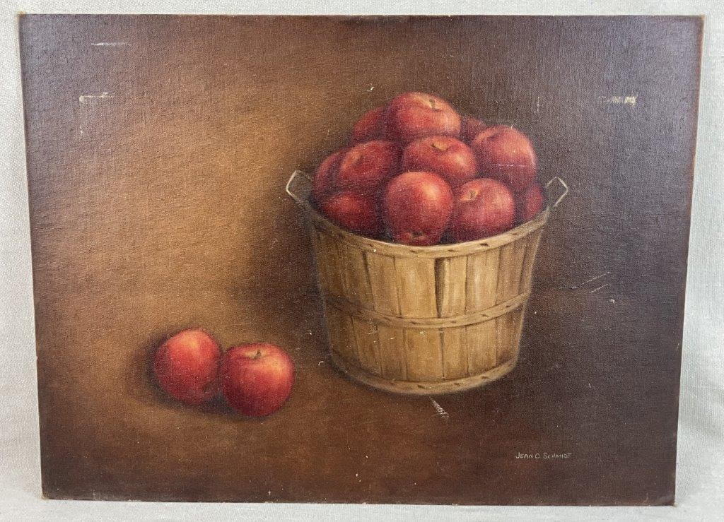 Country Apple Still Life Oil Painting: Oil painting on canvas board depicting a basket of red apples, carefully rendered in a traditional still life composition, signed Jean O. Schmidt. Measures approximately 18â€³ H x 23
