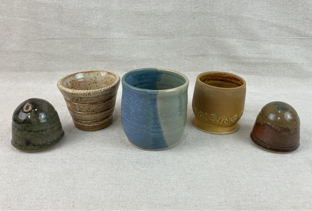 Studio Pottery Assortment: Group of five studio pottery pieces with varied glazes and petite forms, including examples with green and blue dip glaze and a buff speckled finish. The largest measures approximately 3