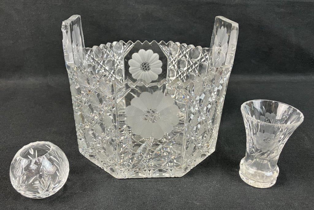 Brilliant American Cut Glass Assortment: Group of three pieces of Brilliant Period cut glass, featuring floral motifs and geometric patterning with sharp, reflective cutting. The largest measures approximately 6â€³ H x 6 7/8&