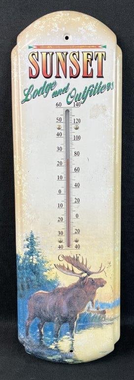 Sunset Moose Motif Thermometer: Vintage thermometer for Sunset Lodge and Outfitters, featuring a printed moose design to the lower half. Measures approximately 17â€³ H x 5â€³ W x 1/4â€³