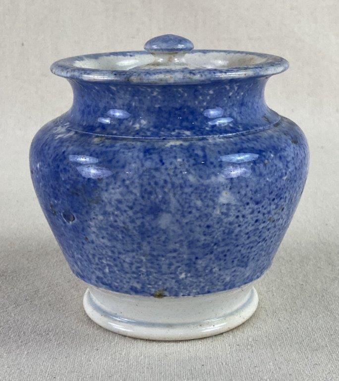 Sprinkle Blue Porcelain Jar: A charming porcelain jar featuring a distinctive sprinkle blue glaze, characterized by its speckled, cobalt-toned finish. The vessel is designed with a globular body that tapers upward into a