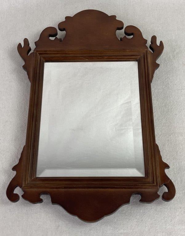 Bombay Chippendale Mirror: This elegant wall mirror from The Bombay Company captures the timeless Chippendale aesthetic, featuring characteristic scrolled ears and a refined, fretwork-inspired silhouette. The piece is fitted wi