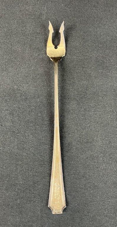 Sterling Silver Olive Fork: Elegant sterling silver olive fork with monogrammed handle, marked for silver content, weighing approximately 27.72 grams. Measures approximately 8â€³ H x 3/4â€³ W x