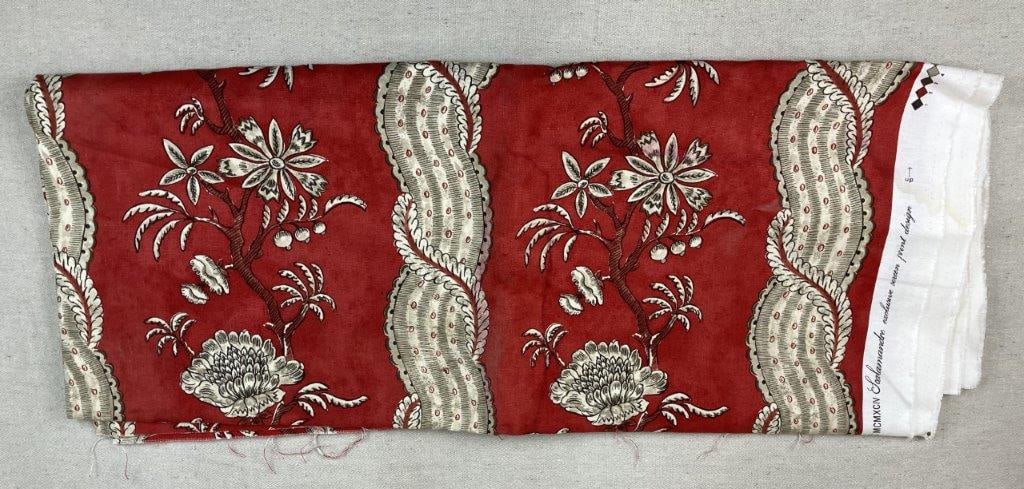 La Gingeoler Flower Motif Fabric: Textile with a red ground and neutral-toned floral motif, attributed to La Gingeoler, presenting a decorative repeating pattern. Measures approximately 96â€³ H x 60â€³