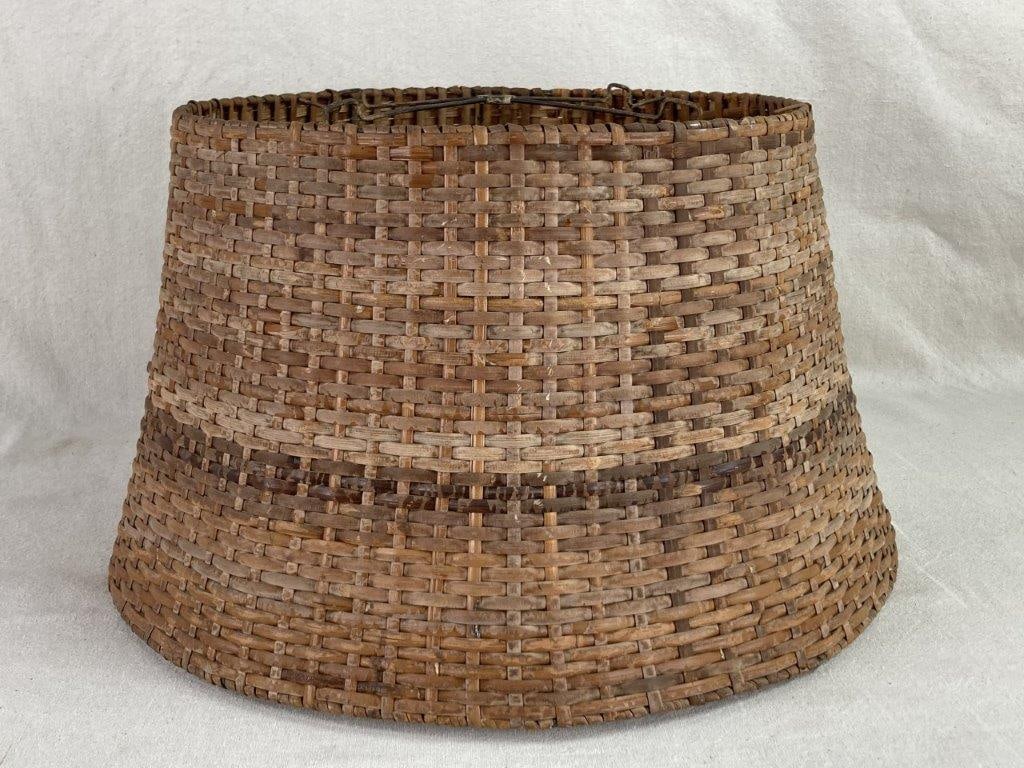 Rivercane Lamp Shade: This substantial river cane woven lamp shade features a soft, lightly tapered profile that widens into a generous circular base. It possesses a beautiful worn aged patina, reflecting the natural