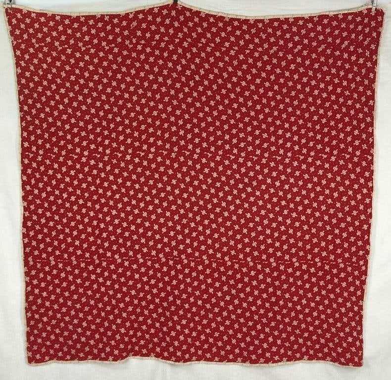 Red Pattern Quilt: Hand-quilted quilt in a red and white palette, featuring a bow-form pattern with traditional construction and a balanced, graphic design. Measures approximately 78 1/4â€³ H x