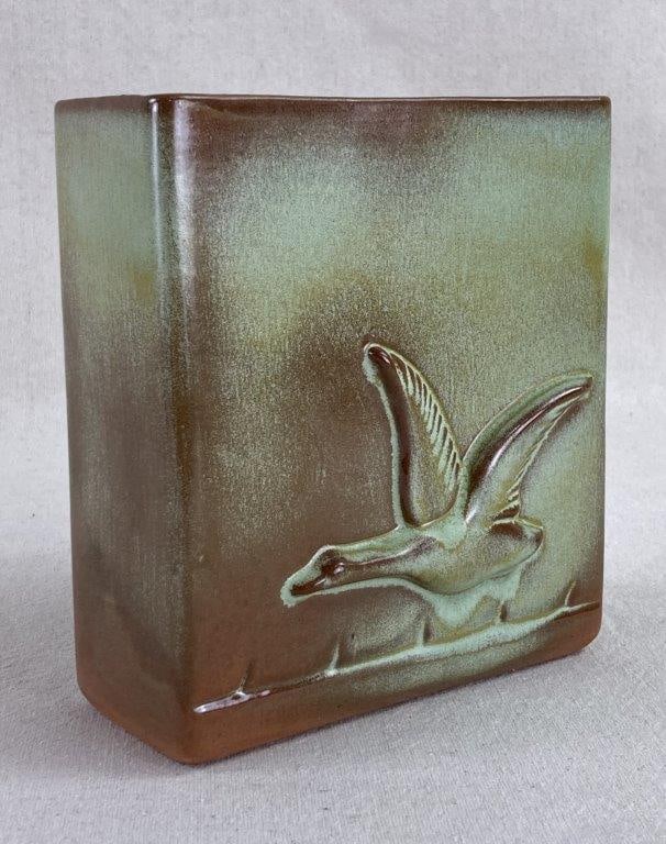 Frankoma Pottery Flying Goose Pillow Vase: This rectangular pottery vase is a quintessential mid-century piece from the celebrated Oklahoma studio Frankoma Pottery. It is finished in their iconic "Prairie Green" glaze, which highlights the