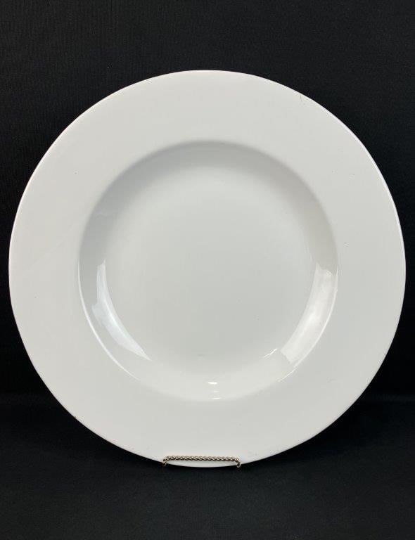 Massive Banana Republic Italian Plate: Large ceramic plate by Banana Republic, made in Italy, with a substantial white-bodied form. Measures approximately 2â€³ H x 17 3/4â€³ in diameter. Minimal wear.Some