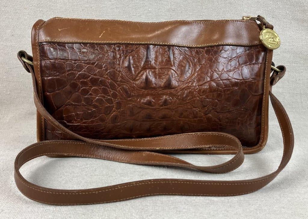 Brahmin Crossbody Alligator Leather Bag: This Brahmin crossbody bag is crafted from rich cognac-brown leather featuring a signature embossed alligator texture and smooth leather trim. The design is accented with brass-tone hardware and a