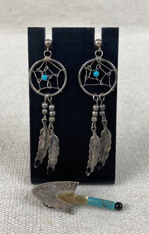 Native American Sterling Silver Pin and Silvertone Dream Catcher Earrings: This Native American-style jewelry set features an arrowhead pin crafted from sterling silver (unmarked but tested for silver content) with mixed-metal accents including brass and a turquoise