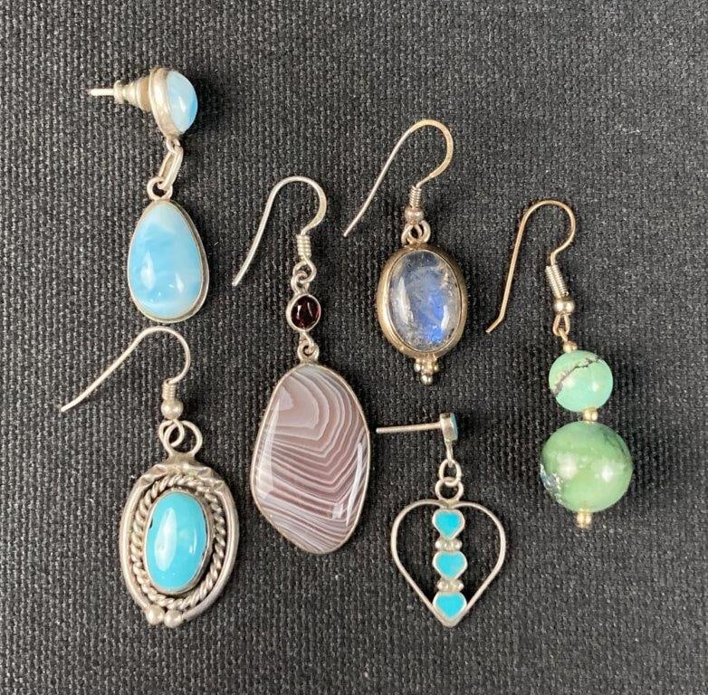 Collection of Six Pierced Mismatched Earrings: Group of six pierced mismatched earrings including examples set with turquoise, labradorite, and other stones, with some sterling silver examples present. Longest earring measures approx. 1 1/8 in.