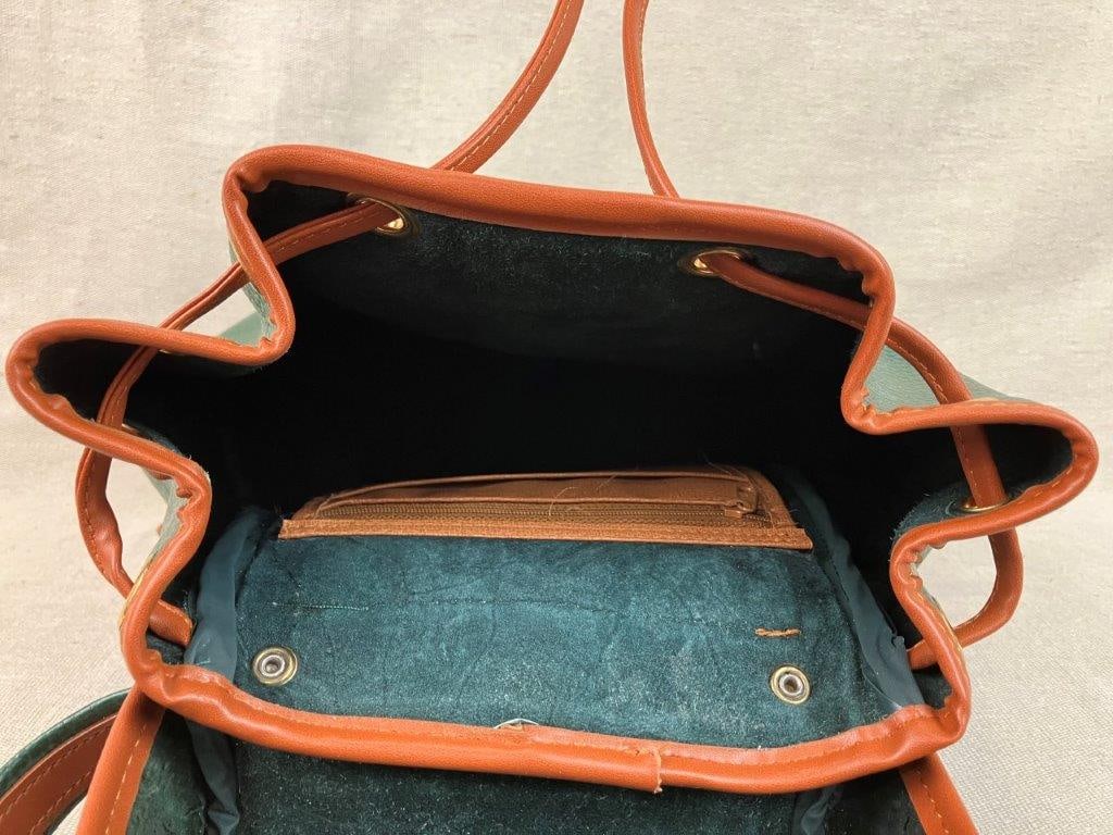 Dooney & Bourke All Weather Leather Backpack - 10
