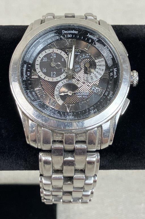 Citizen Eco-Drive Calibre 8700: A sophisticated silver-tone stainless steel men's timepiece from the "Calibre 8700" collection by Citizen. This high-function watch is powered by Eco-Drive technology, eliminating the need for a