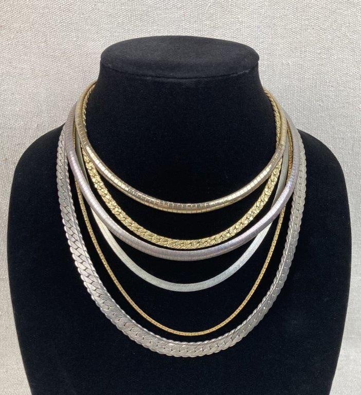 Sterling Silver and 14K GF Necklaces with Costume Necklaces: A handsome assortment of chain necklaces featuring a versatile mix of precious metals and classic costume styles. Included in the assortment is a sterling silver omega chain necklace (stamped "925