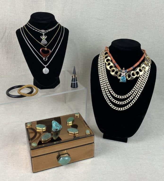 Vintage Jewelry Assortment with Mirrored Faux Turquoise Box: Decorative mirrored jewelry box in a rose gold tone finish, accented by faux chalcedony and faux turquoise stones set within the frame, containing an assortment of costume jewelry pieces. Box