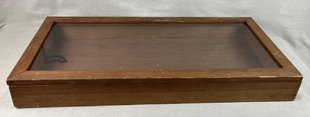 Large Display Case: This wooden display case with nailed construction, ideal for showcasing jewelry or antique collections, features a classic wood exterior and a clear glass top with a convenient hinged lid. Measuring