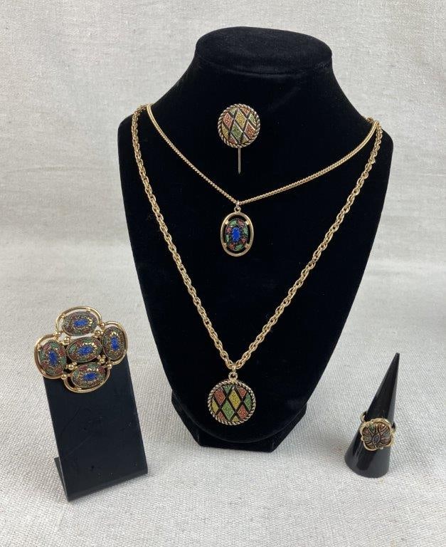 Sarah Coventry Gold Tone and Enamel Costume Jewelry Assortment: Group of five vintage costume jewelry pieces by Sarah Coventry, including a standout matching set with a central geometric enamel design in red, green, and yellow tones within a gold tone setting,