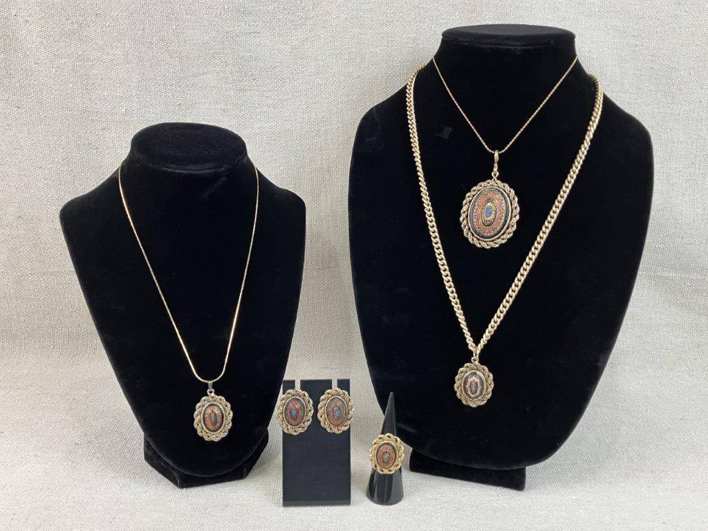 Sarah Coventry Old Vienna Jewelry Set: This comprehensive Sarah Coventry "Old Vienna" collection features a regal, folk-art inspired design with gold-tone bases and painted faux-enameled centers in black, brick red, and blue. The set inclu