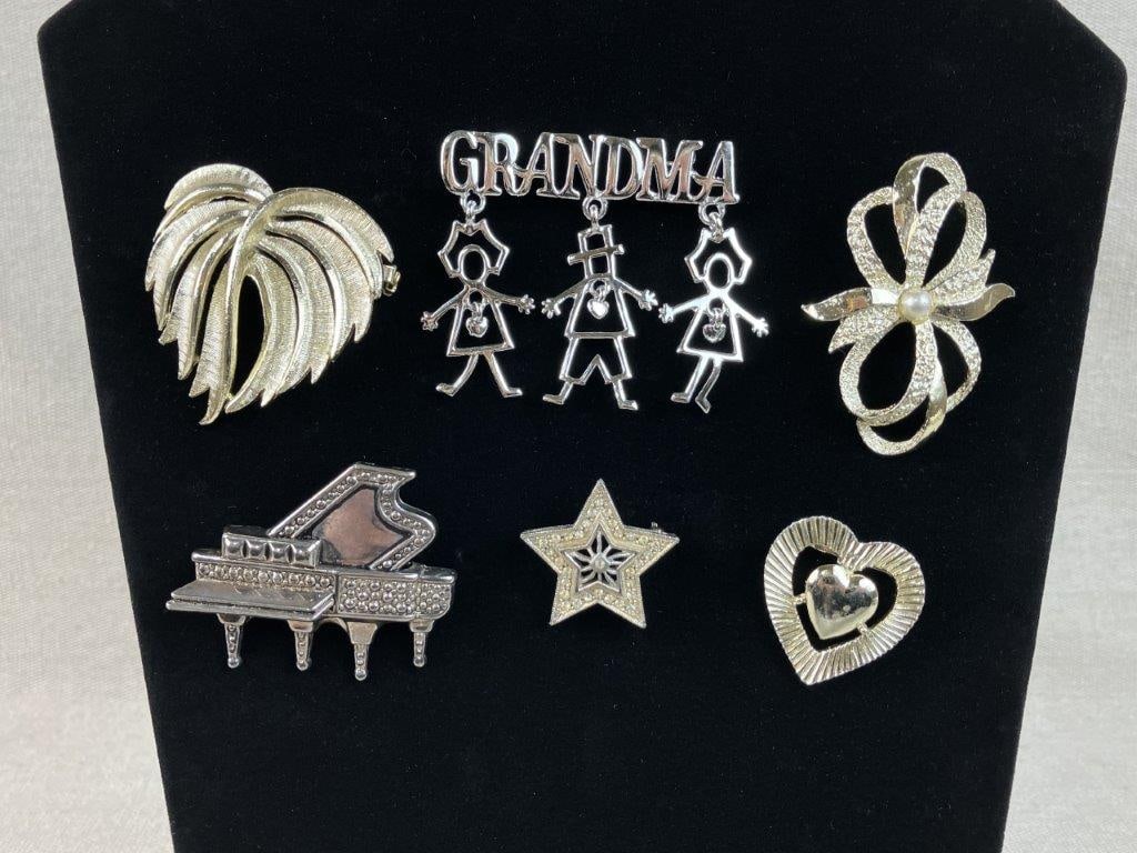Collection of Gold and Silver-Tone Earrings and Brooches - 10