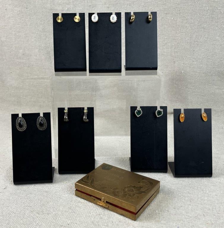 Assortment of Vintage Earrings with Brass Earring Caddy: This seven-pair collection of vintage costume earrings is housed in a charming vintage brass compact labeled "Pierced Earring Caddy." Featured designs include a pair of teardrop black cabochon