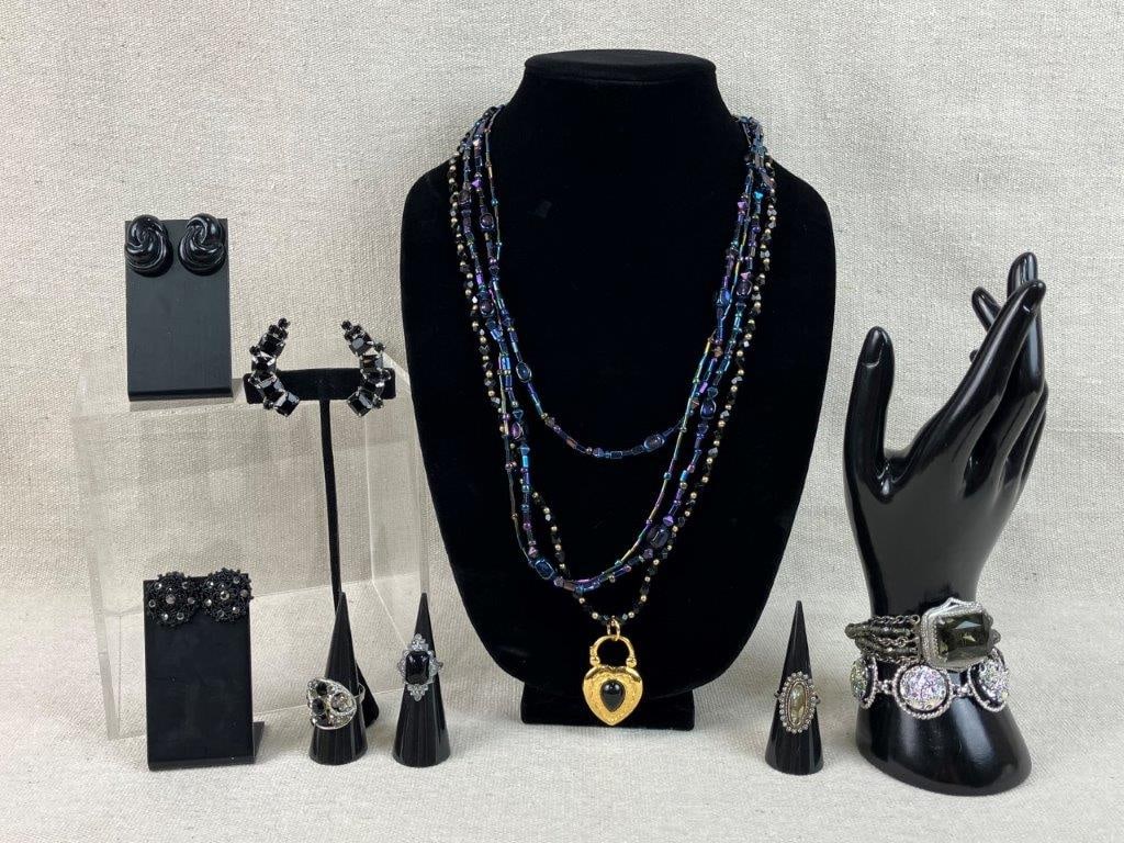 Assortment of Dark and Silvertone Jewelry Including Florenza: Group of ten pieces of vintage costume jewelry in dark tones and silvertone settings, including a variety of beaded and stone-set examples, three rings (sizes approx. 7, 3, and 6), and a standout