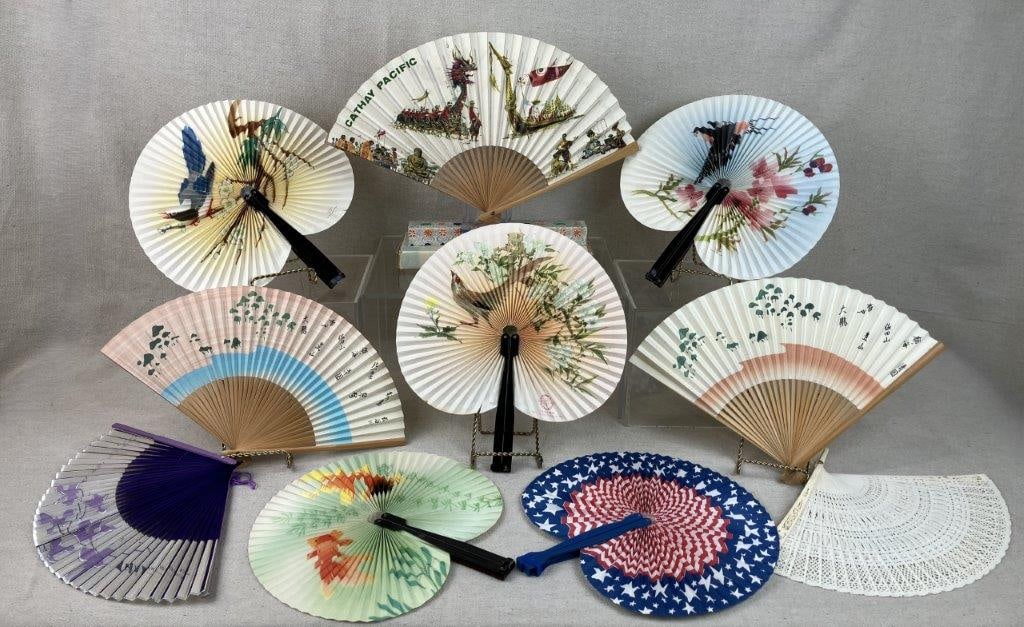 Assortment of Nine Vintage Chinese Fans: Group of vintage fans including examples of Chinese and Thai origin, one marked Thai International, with a variety of materials including hand-painted paper, bamboo, and mixed media construction.