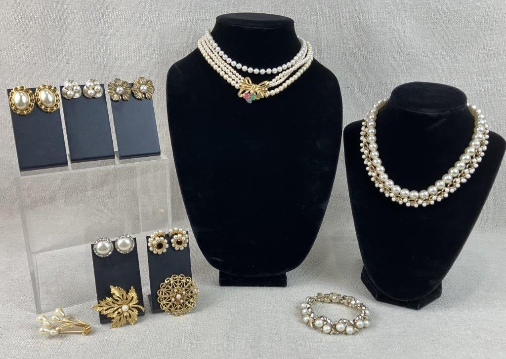 Faux Pearl Costume Jewelry Assortment Including Richelieu, Napier, and Coro: Thirteen pieces of vintage costume jewelry featuring faux pearls in a variety of designs, including a standout pair of Coro earrings with three central faux pearls framed by swirling silvertone settin