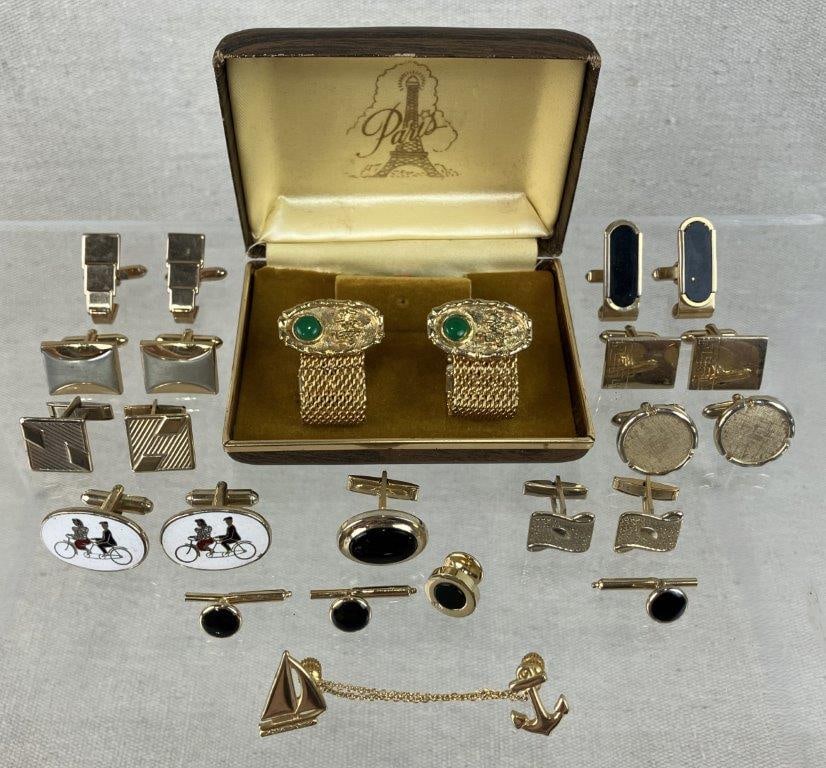 Vintage Men's Gold-Tone Cufflink Collection: A handsome twelve-piece collection of vintage men's cufflinks featuring gold-tones throughout in a variety of distinguished designs, highlighted by a pair with a central green acrylic cabochon in a go