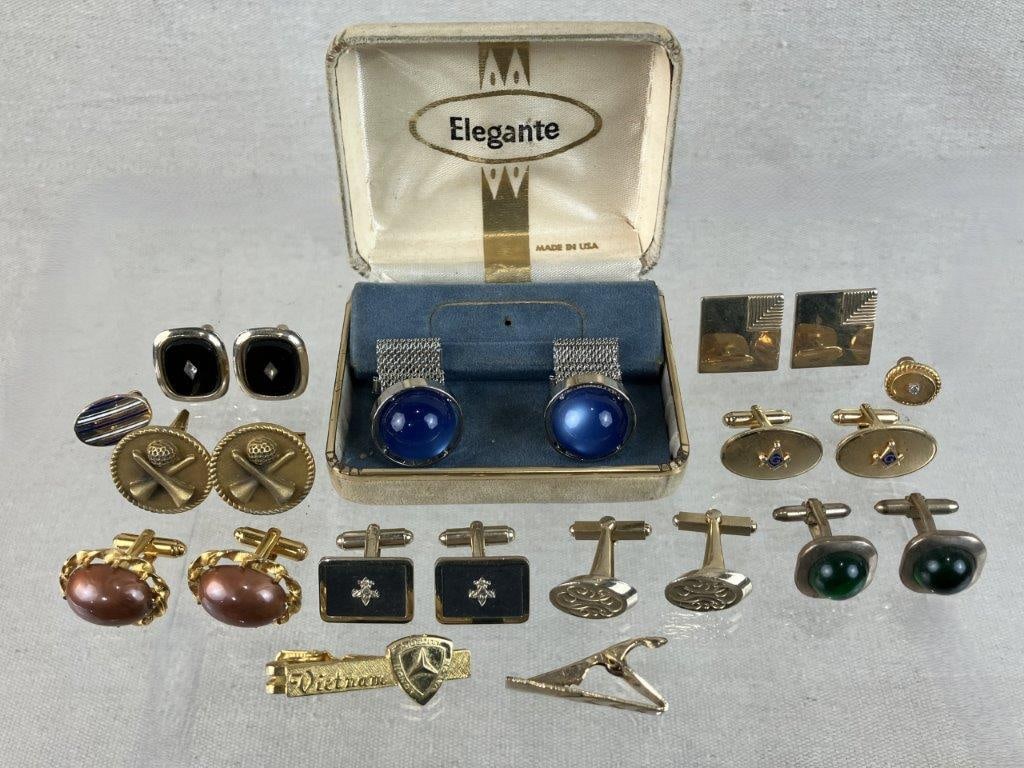 Men's Vintage Cufflinks and Tie Clips: This thirteen-piece variety of men's vintage cufflinks features masculine and distinguished designs in silver and gold-tones, highlighted by two gold-tone tie clips and a standout pair of cufflinks wi