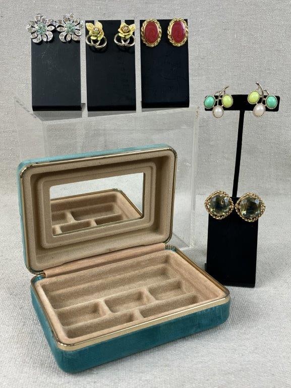 Vintage Costume Jewelry Earrings and Jewelry Box: This five-piece collection features a coordinating soft green velvet jewelry box housing a selection of vintage earrings. Highlights include Sarah Coventry silver-tone and rhinestone flower earrings