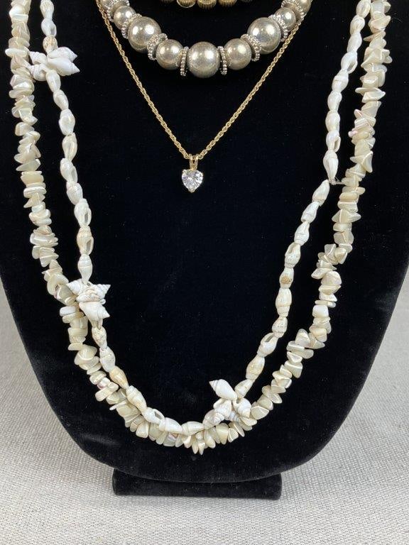 Assortment of Gold and Silver-Tone Jewelry - 4