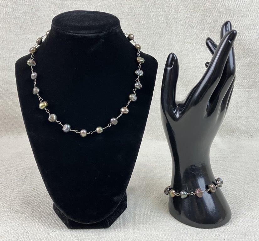 Freshwater Pearl Necklace and Bracelet: This two-piece jewelry set features irregularly shaped baroque freshwater pearls showcasing a beautiful iridescent sheen. The set includes a 17 in. L necklace and a matching 7 3/4 in. L bracelet, the
