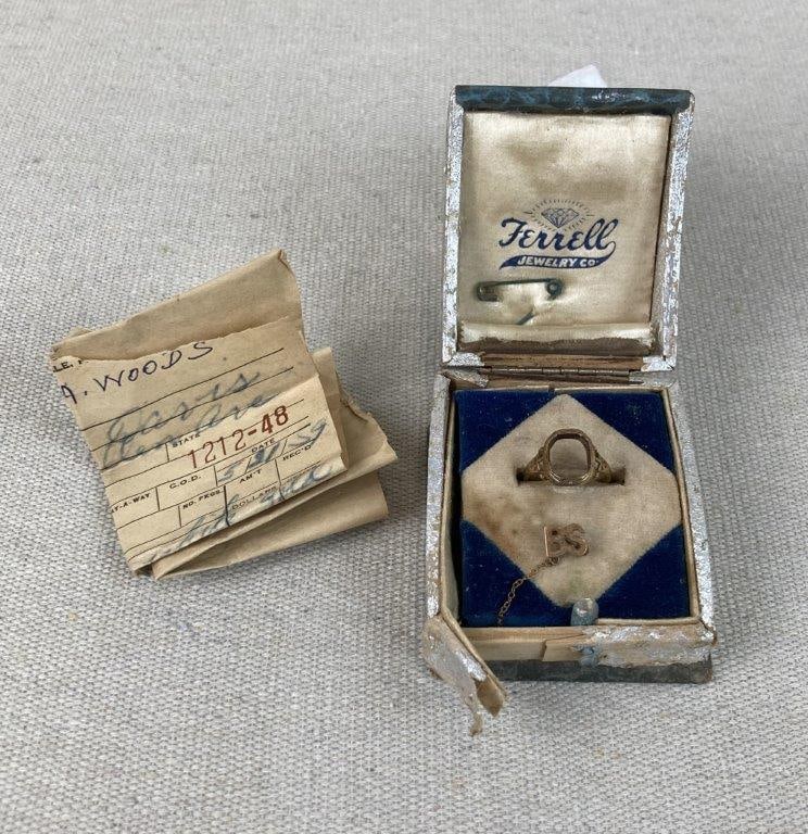 20th Century 18K Gold Ring with 14K Gold Charm: This gold jewelry lot features an 18K gold ring and a 14K gold charm. The 18K gold ring is designed with an oval-shaped setting (size 5.25) and weighs 2.27 grams. The accompanying small 14K gold