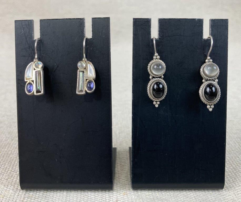 Two Pairs of Vintage Sterling Silver Earrings with Gemstones: This two-pair collection of vintage sterling silver earrings showcases beautiful gemstone combinations and distinct design styles. The assortment includes a pair of modernist-style earrings featuring