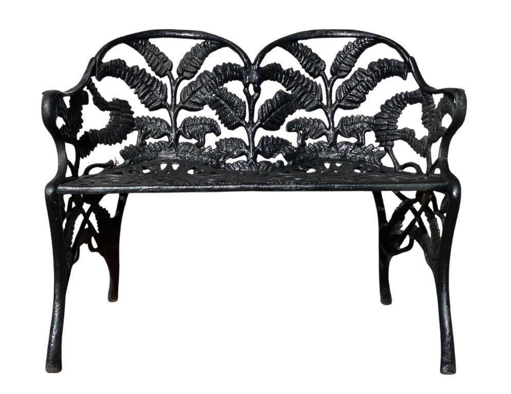 James W. Carr, Richmond, Virginia Cast-Iron Fern Pattern Bench Settee: A fine late 19th century cast-iron bench settee by James W. Carr of Richmond, Virginia, cast in four sections in the desirable fern pattern. The double-back form features rolled arms above a