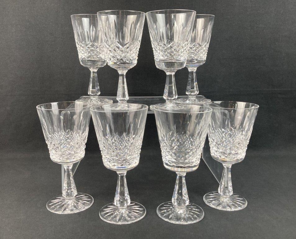Eight Waterford Kenmare Water Goblets: This set of eight Waterford water goblets is crafted in the beautifully cut Kenmare pattern, featuring elegant forms and brilliant cut-crystal details. An individual goblet measures approximately 6 7/