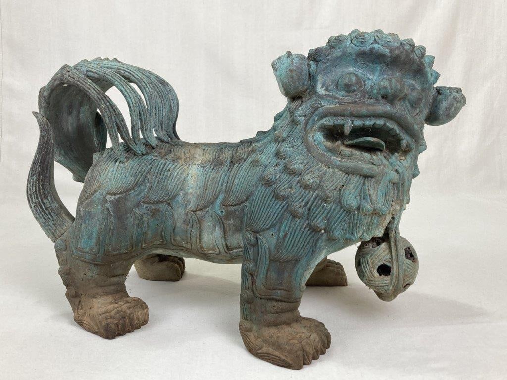 Large Chinese Bronze Guardian Lion: A Chinese bronze guardian lion with highly detailed face, fur, and tail. The figure is heavy and large with a nice aged patina. It measures approximately 15 inches high x 9 inches wide x 22 inches