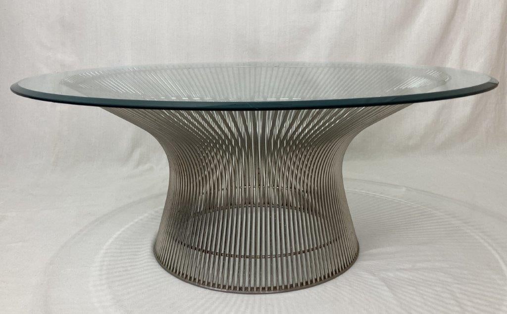 Warren Platner for Knoll Coffee Table: This iconic mid-century piece features the celebrated sculptural wire frame composed of curved, vertical steel rods, creating a captivating architectural silhouette. The elegant base is topped with a 