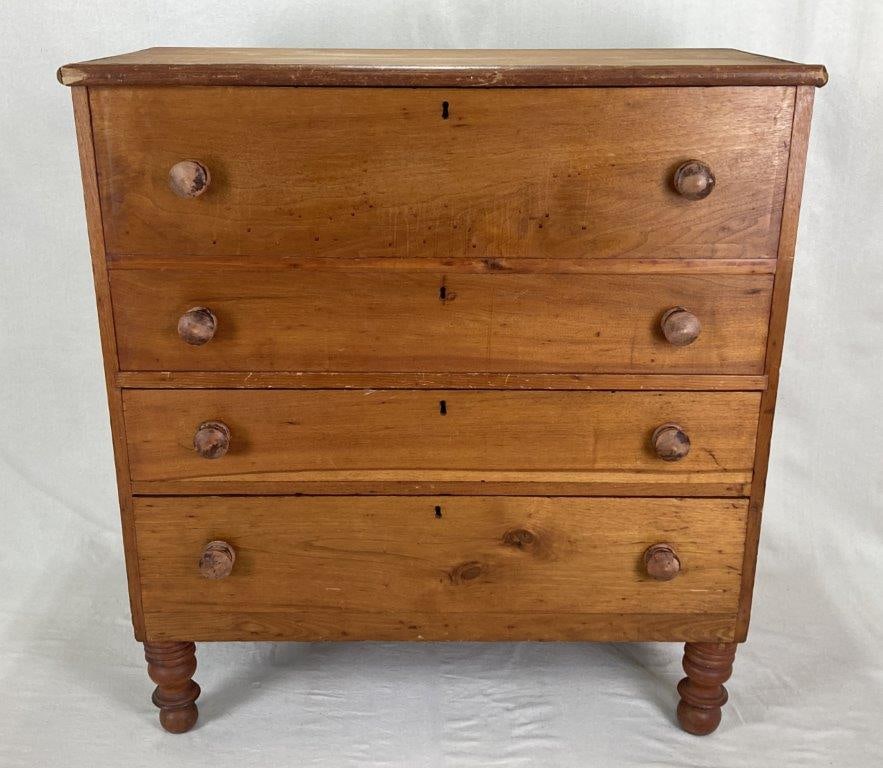 19th Century Mule Chest: A handsome 19th century country mule chest, constructed in pine with a rich, warm patina. The hinged lid opens to reveal a capacious storage compartment, above two full-width drawers. The case is rais