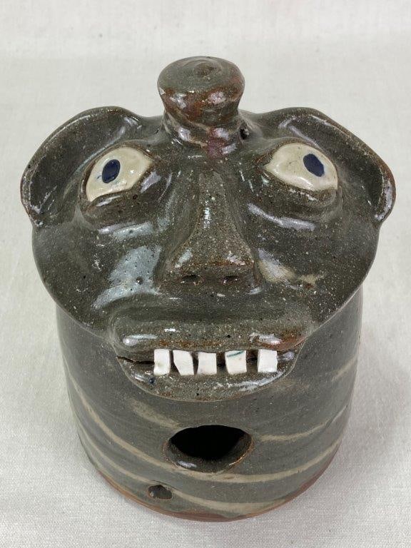 B.B. Craig Face Jug Birdhouse: Rare and characterful piece is a quintessential example of the work of Burlon B. Craig (ca. 1914â€“2002), a master of North Carolinaâ€™s traditional folk pottery.