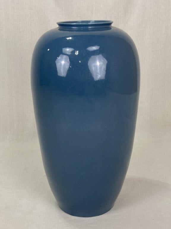 Mid-Century Modern Tall Art Pottery Vase: Striking mid-century modern art pottery vase features an impressive, substantial stature and a graceful curving form that beautifully captures the sleek minimalism of retro 20th-century design. The