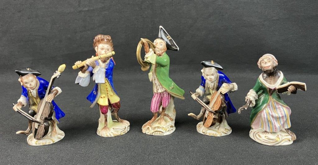 German Volkstedt and Sitzendorf Porcelain Monkey Musical Band: This charming five-piece German porcelain monkey character band beautifully showcases classic European artistry with its whimsical sculpting and delicate hand-painted details. The lively ensemble