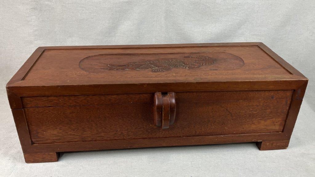 Folk Art Carved Cedar Alligator Chest: Distinctive cedar storage box embodies a classic Southern folk aesthetic. The top features an impressively carved alligator design executed in high relief with fine, naturalistic details that