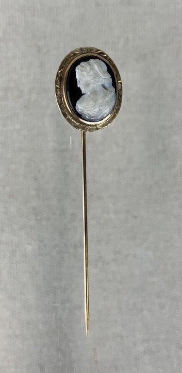 10 KT Gold Cameo Stick Pin: Elegant late 19th-century stick pin features an exquisitely carved black and white shell cameo profile, beautifully framed within a classic gold bezel setting. Unmarked but fully tested for 10-karat