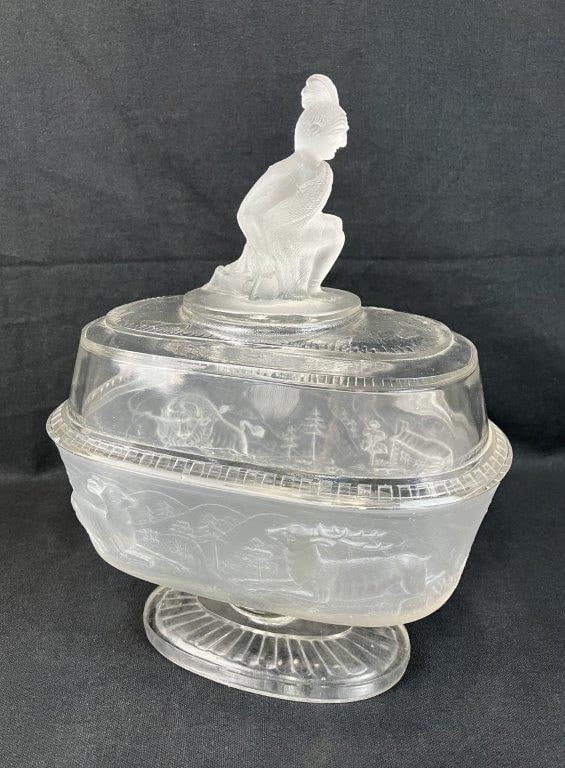 Gillinder Westward Ho Glass Covered Oval Compote: 19th-century Early American Pattern Glass (EAPG) compote beautifully showcases the pioneering spirit and exceptional craftsmanship of the historic Gillinder & Sons glassworks of Philadelphia,