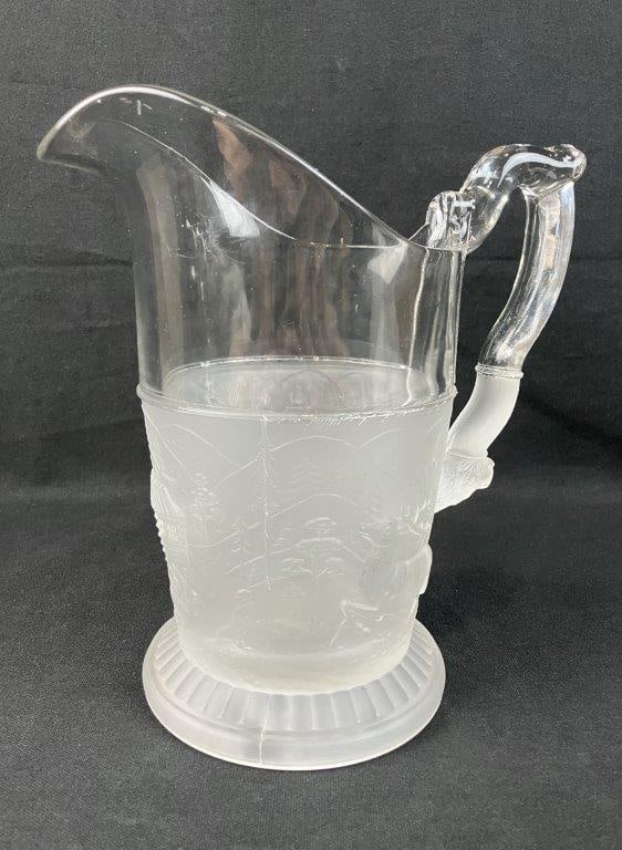 Gillinder Westward Ho Pressed Glass Pitcher: This circa 1879 64 oz. pitcher beautifully showcases the pioneering spirit and exceptional craftsmanship of the historic Gillinder & Sons glassworks of Philadelphia, Pennsylvania. The celebrated