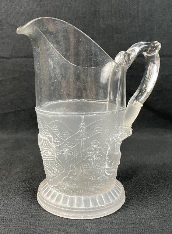 Gillinder Westward Ho Pressed Glass Milk Pitcher: This circa 1879 milk pitcher beautifully showcases the pioneering spirit and exceptional craftsmanship of the historic Gillinder & Sons glassworks of Philadelphia, Pennsylvania. The celebrated