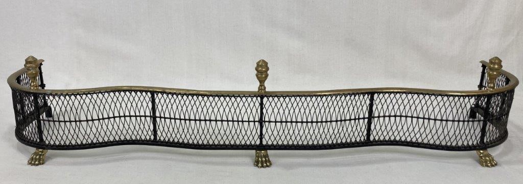 Virginia Metalcrafters Wirework Fire Fender: A Virginia Metalcrafters wirework fire fender with paw feet and an attractive woven screen design. It measures approximately 7Â½ inches high x 48 inches wide x 14 inches deep. In good