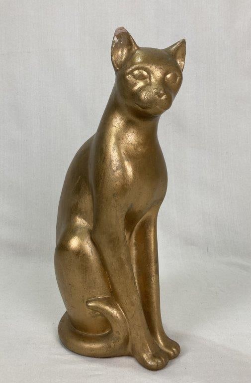 Mid-Century Modern Vanguard Egyptian Gilt Cat: This striking decorative piece by Vanguard Studios elegantly merges mid-century modernist sensibilities with the enduring allure of Egyptian Revival design. Expertly sculpted, the form mimics